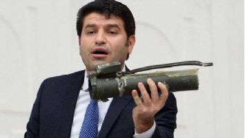 HDP'li Aslan  Meclis k&uuml;rs&uuml;s&uuml;ne roket atarla &ccedil;ıktı