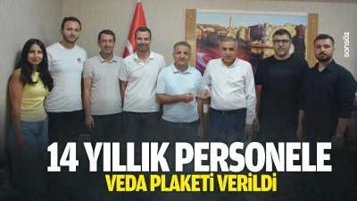 14 yıllık personele veda plaketi verildi