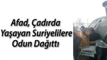 AFAD, &Ccedil;ADIRDA YAŞAYAN SURİYELİLERE ODUN DAĞITTI