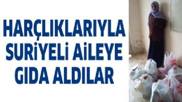 HAR&Ccedil;LIKLARIYLA SURİYELİ AİLEYE GIDA ALDILAR