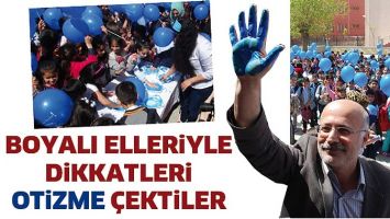 BOYALI ELLERİYLE DİKKATLERİ OTİZME &Ccedil;EKTİLER