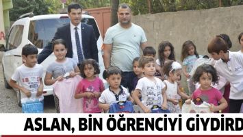 ASLAN, BİN &Ouml;ĞRENCİYİ GİYDİRDİ