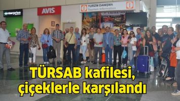 T&Uuml;RSAB KAFİLESİ, &Ccedil;İ&Ccedil;EKLERLE KARŞILANDI