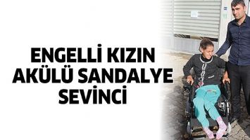 ENGELLİ KIZIN AK&Uuml;L&Uuml; SANDALYE SEVİNCİ