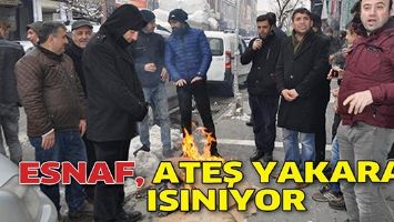 ESNAF, ATEŞ YAKARAK ISINIYOR
