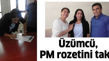 &Uuml;Z&Uuml;MC&Uuml;, PM ROZETİNİ TAKTI