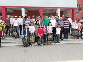 T&Uuml;RKAB, 100 &Ccedil;OCUĞU GİYDİRDİ