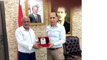 &Ouml;ZEL İDARE&rsquo;YE PLAKET