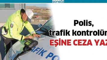 POLİS, TRAFİK KONTROL&Uuml;NDE EŞİNE CEZA YAZDI