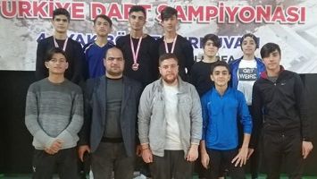 DART&Ccedil;ILAR, 2 MADALYA İLE D&Ouml;ND&Uuml;