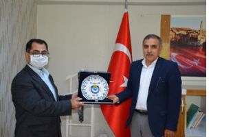 &Ouml;zperk&rsquo;e HAK İŞ plaketi