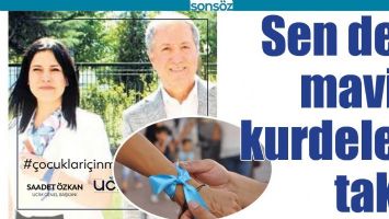 SEN DE MAVİ KURDELE TAK