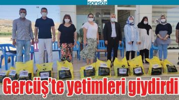 GERC&Uuml;Ş&rsquo;TE YETİMLERİ GİYDİRDİLER