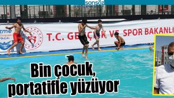BİN &Ccedil;OCUK, PORTATİFLE Y&Uuml;Z&Uuml;YOR