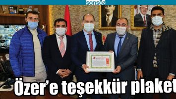 &Ouml;ZER&rsquo;E TEŞEKK&Uuml;R PLAKETİ