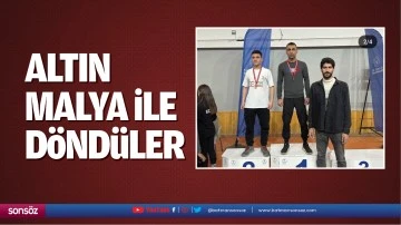 Altın malya ile d&ouml;nd&uuml;ler