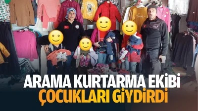 Arama Kurtarma Ekibi, &ccedil;ocukları giydirdi