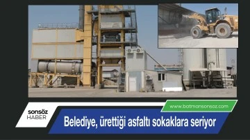 Belediye, &uuml;rettiği asfaltı sokaklara seriyor