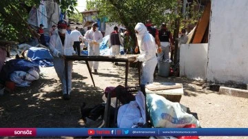 Bir evden 42 kamyon &ccedil;&ouml;p &ccedil;ıkarıldı