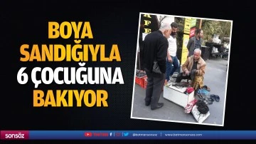 Boya sandığıyla 6 &ccedil;ocuğuna bakıyor