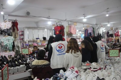 Cizre'de yetim &ccedil;ocuklara bot ve mont desteği