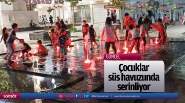 &Ccedil;ocuklar s&uuml;s havuzunda serinliyor