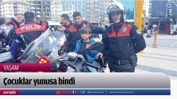 &Ccedil;ocuklar yunusa bindi
