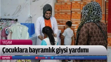&Ccedil;ocuklara bayramlık giysi yardımı