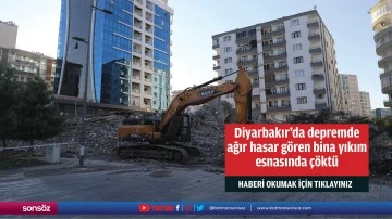 Depremde ağır hasar g&ouml;ren bina yıkım esnasında &ccedil;&ouml;kt&uuml;