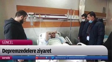 Depremzedelere ziyaret