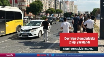 Devrilen otomobildeki 2 kişi yaralandı