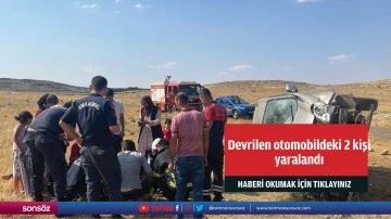 Devrilen otomobildeki 2 kişi yaralandı