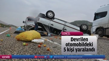 Devrilen otomobildeki 5 kişi yaralandı