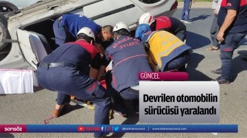 Devrilen otomobilin s&uuml;r&uuml;c&uuml;s&uuml; yaralandı