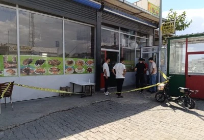 Diyarbakır'da kardeşler arasında &ccedil;ıkan silahlı kavgada &ccedil;evredeki 2 kişi yaralandı