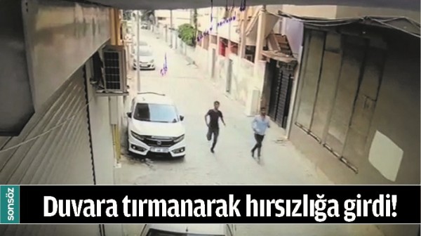 DUVARA TIRMANARAK HIRSIZLIĞA GİRDİ!