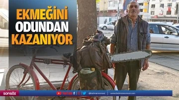 Ekmeğini odundan kazanıyor