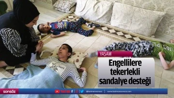 Engellilere tekerlekli sandalye desteği