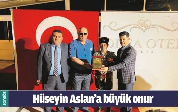 H&Uuml;SEYİN ASLAN&rsquo;A B&Uuml;Y&Uuml;K ONUR