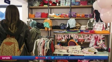 İhtiya&ccedil; sahibi &ccedil;ocuklara kıyafet yardımı yapılıyor