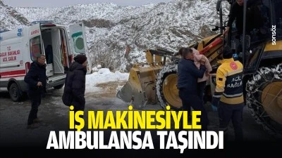 İş makinesiyle ambulansa taşındı