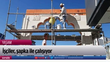 İş&ccedil;iler, şapka ile &ccedil;alışıyor