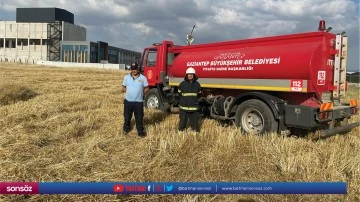 İtfaiye ekipleri, &ccedil;ift&ccedil;ilerle mahsul n&ouml;beti tutuyor