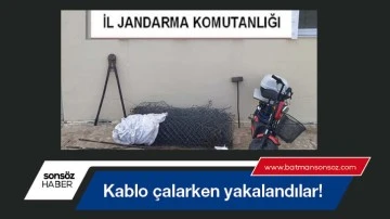 Kablo &ccedil;alarken yakalandılar!