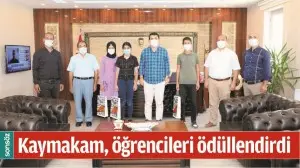 KAYMAKAM, &Ouml;ĞRENCİLERİ &Ouml;D&Uuml;LLENDİRDİ