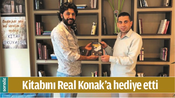 KİTABINI REAL KONAK&rsquo;A HEDİYE ETTİ