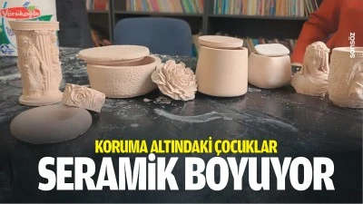 Koruma altındaki &ccedil;ocuklar, seramik boyuyor