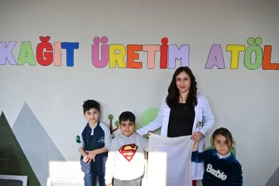 Kurtalan'da &ouml;ğrenciler geri d&ouml;n&uuml;ş&uuml;mle kağıt yapıyor