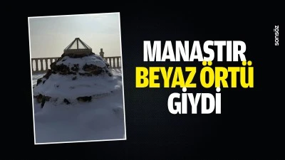 Manastır beyaz &ouml;rt&uuml; giydi