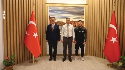 Milli g&uuml;reş&ccedil;i Sinan Sadak, Kaymakam Baycar'ı ziyaret etti